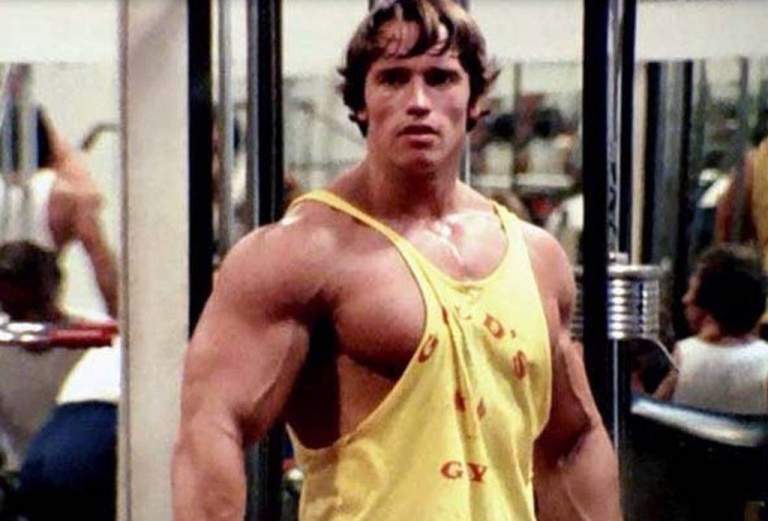 History of the Iconic Gold’s Gym Stringer Vest